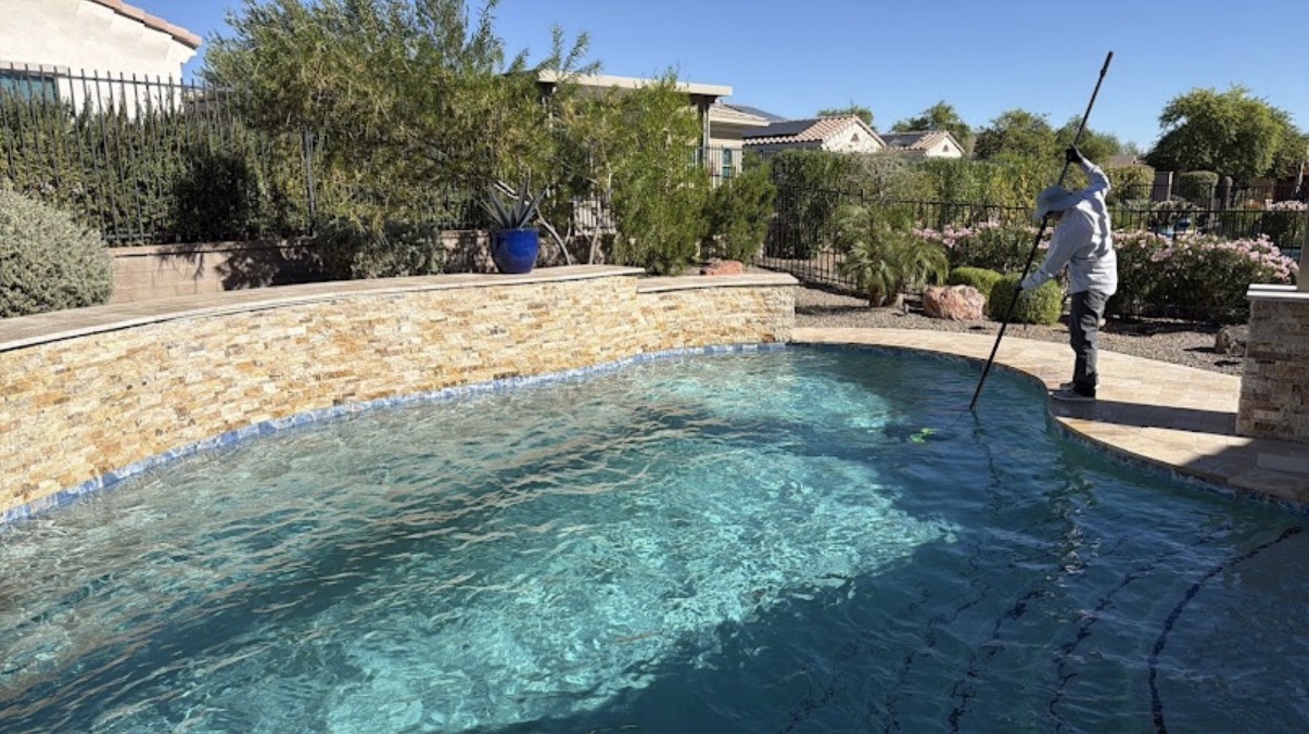 Cody brushing pool walls